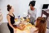 Why Coffee is a Diuretic: Everything You Should Know - friends enjoying coffee and pastries together at a table