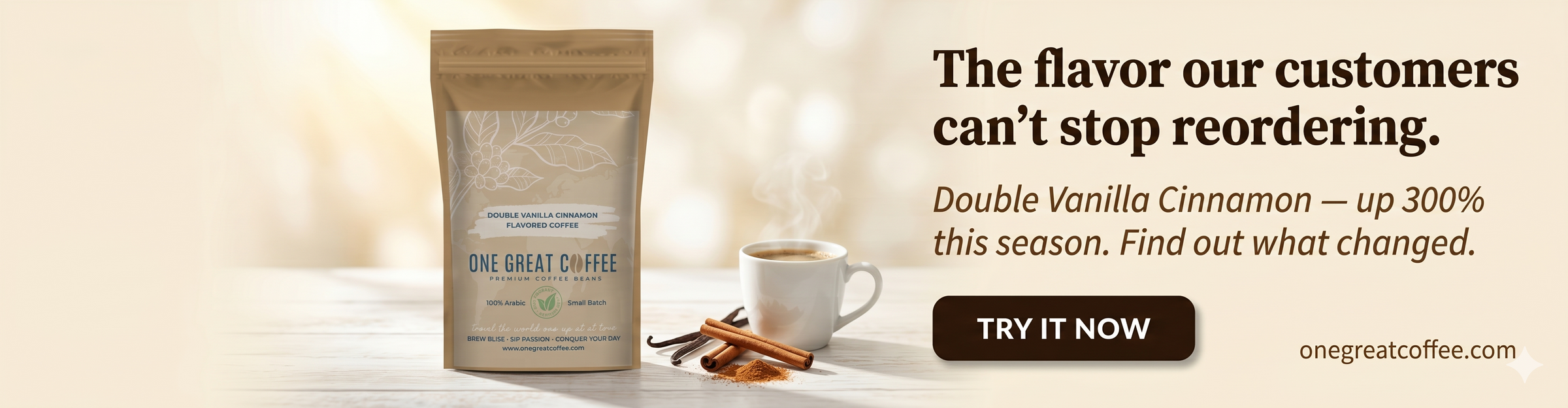 Double Vanilla Cinnamon flavored coffee bag from One Great Coffee on a whitewashed wooden surface, surrounded by vanilla bean pods, cinnamon sticks, and a steaming white mug of freshly brewed coffee in warm morning light — promotional banner highlighting a 300% increase in customer reorders this season.